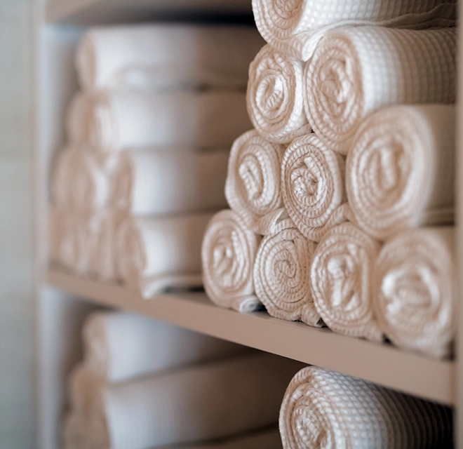 White towels on shelf.