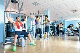 Group of people training in the gym.